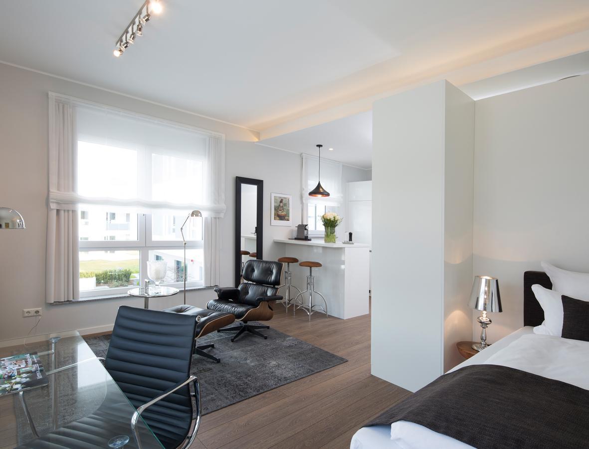 Logis First Class Business Suites Renningen Habitación foto